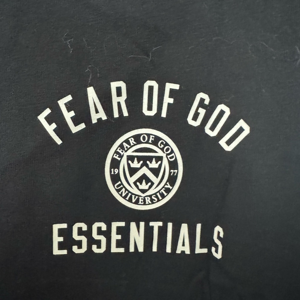 Fear of God Essentials Black Tee with Cream Logo
